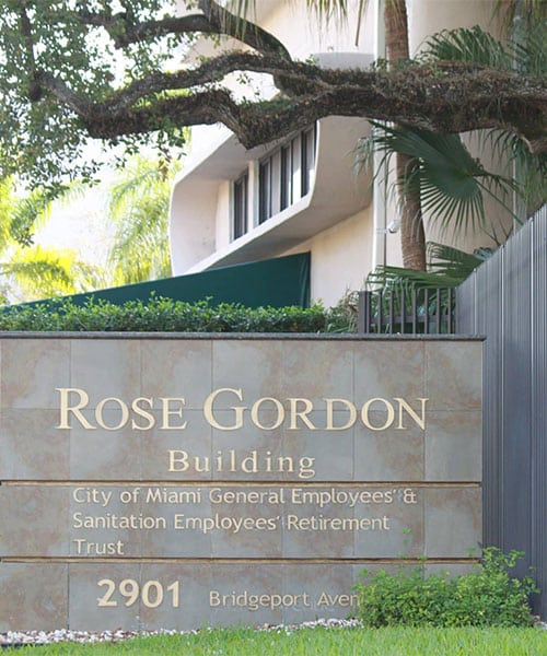 City of Miami GESE Retirement Fund - Rose Gordon Building with sign and gate